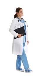 Full length portrait of female doctor with clipboard isolated on white. Medical staff