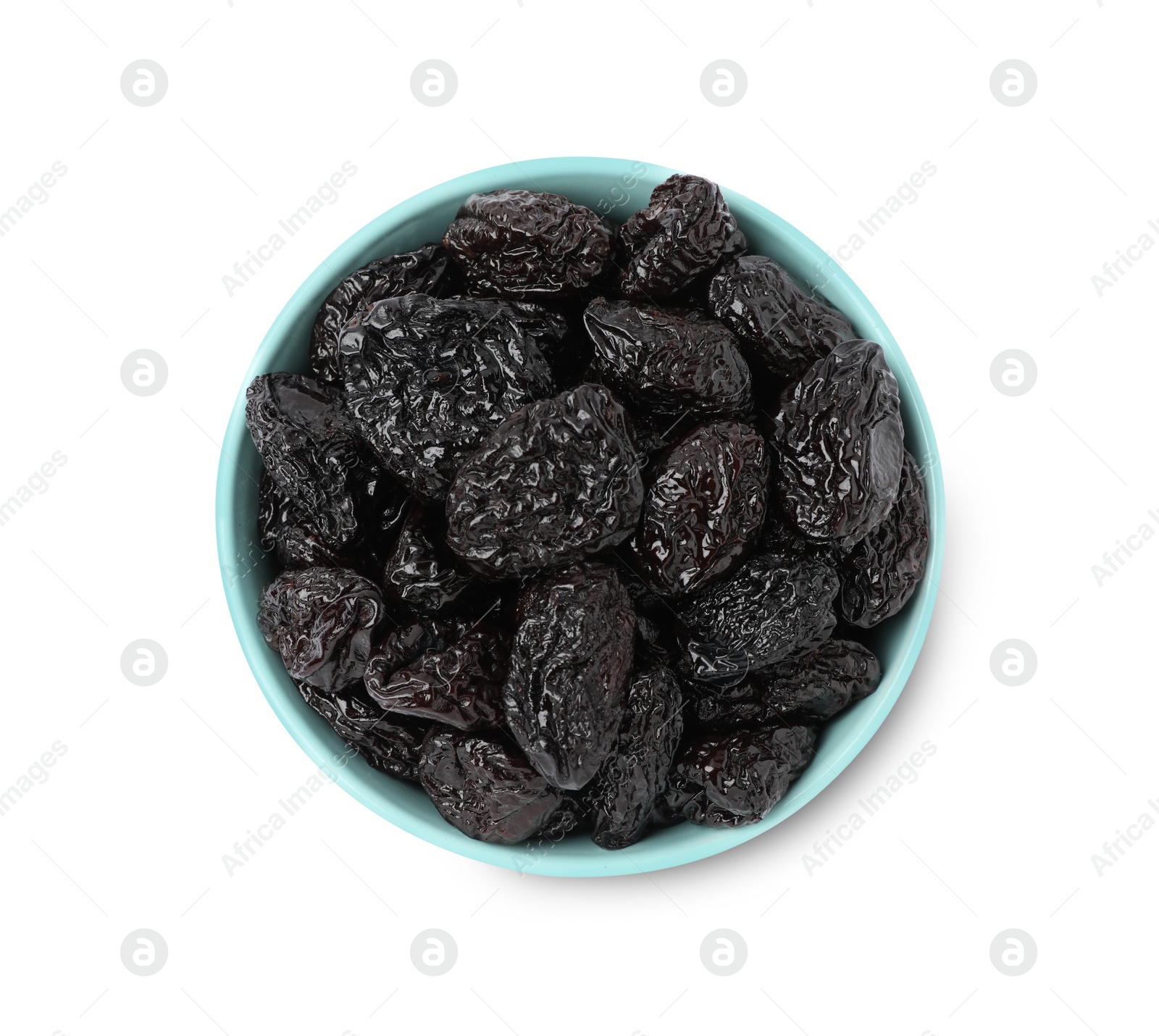 Photo of Bowl with sweet dried prunes isolated on white, top view