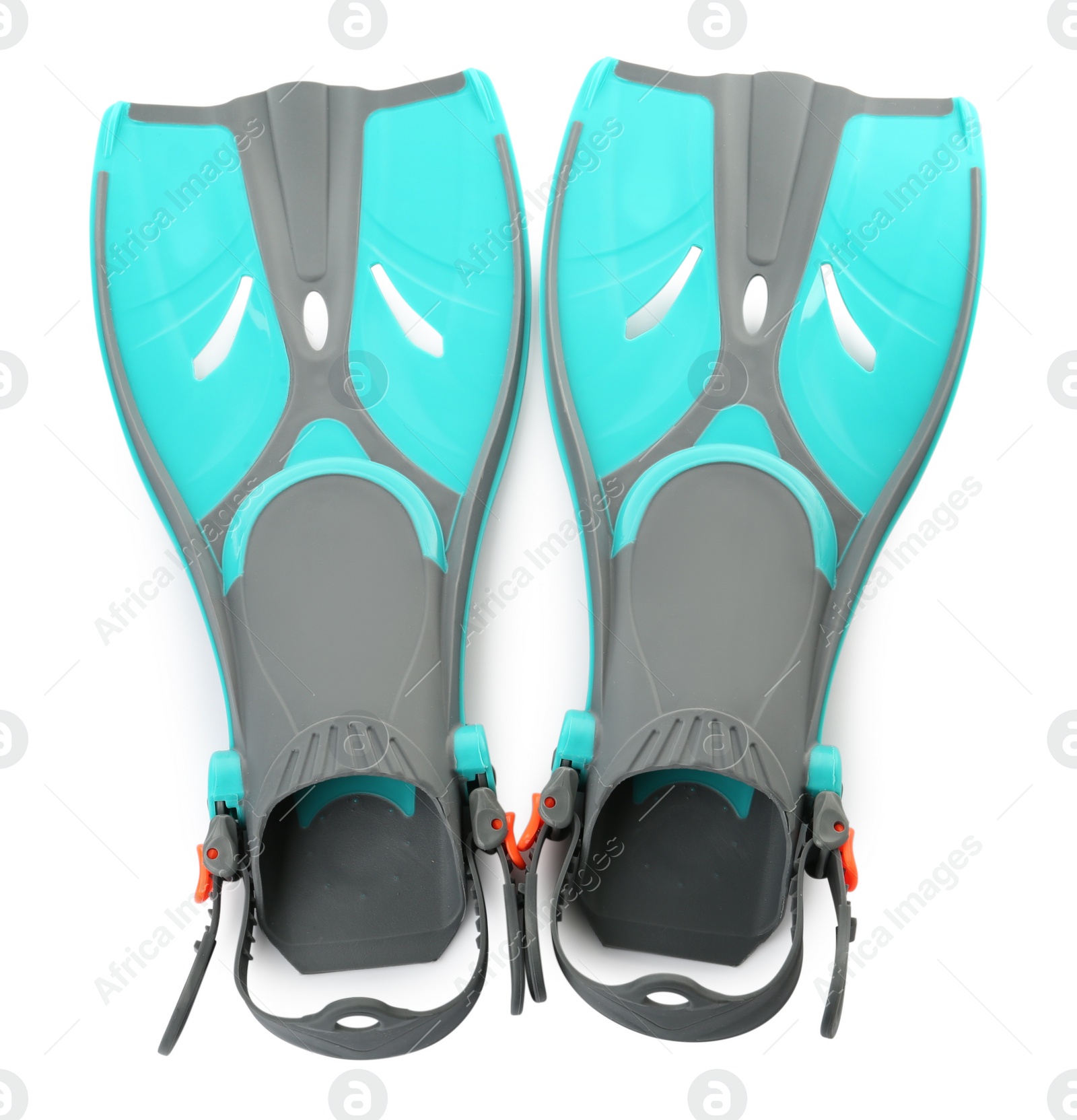 Photo of Pair of turquoise flippers on white background, top view