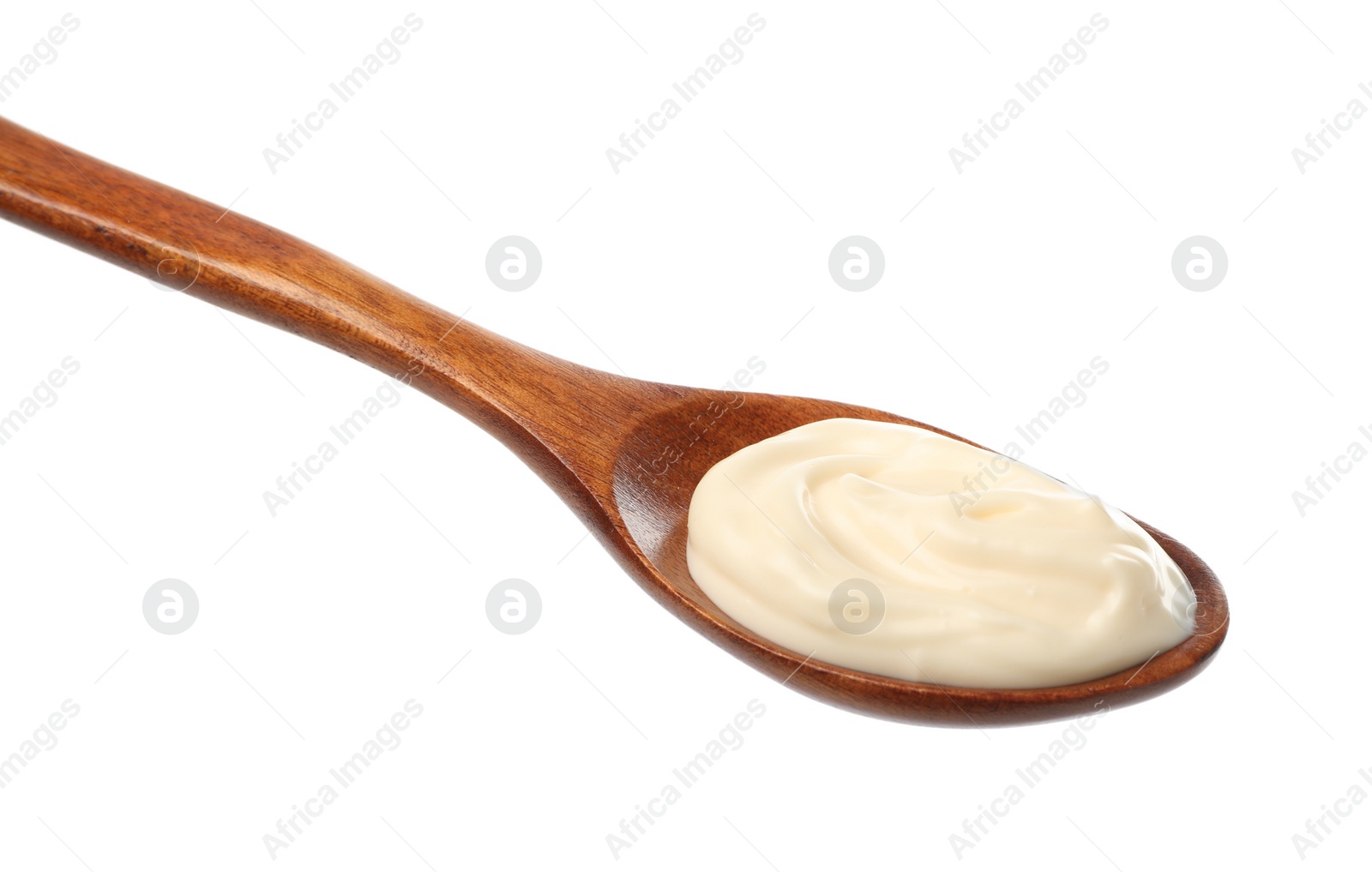 Photo of Wooden spoon with mayonnaise isolated on white