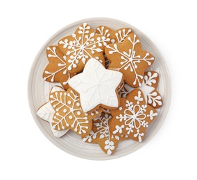 Photo of Tasty star shaped Christmas cookies with icing isolated on white, top view