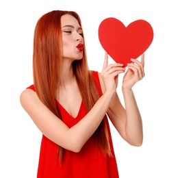 Photo of Young woman in red dress with paper heart on white background