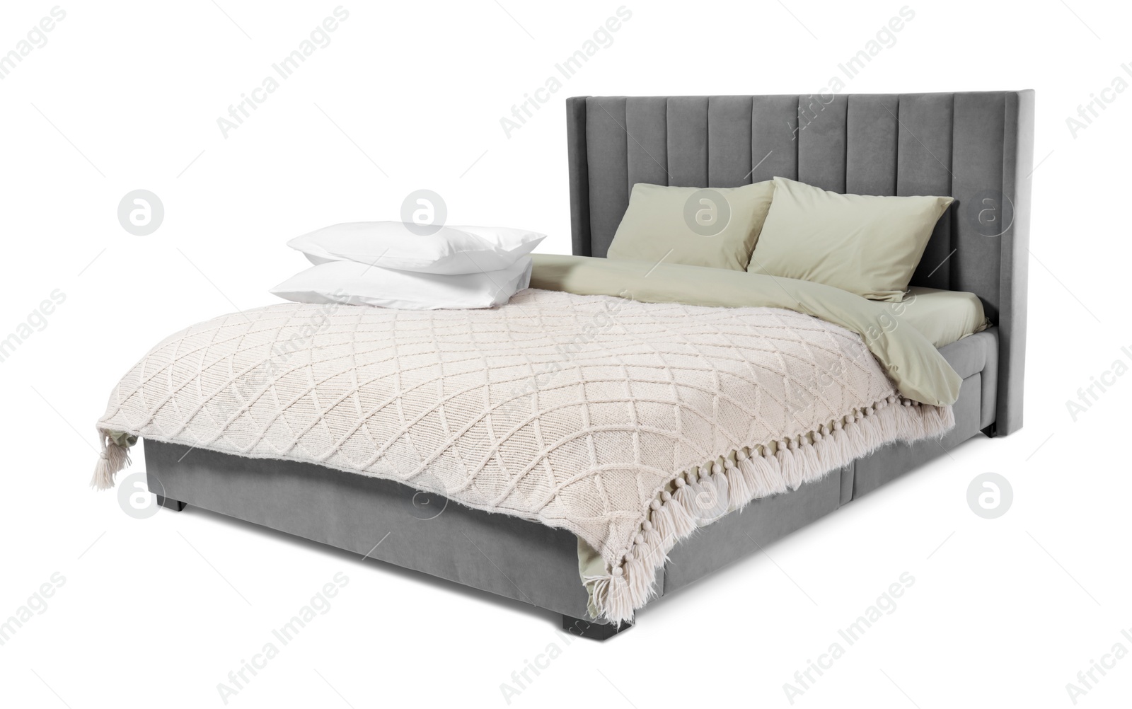 Photo of Comfortable gray bed with linens on white background