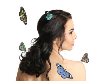 Beautiful young woman and butterflies on white background