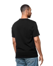 Man wearing black t-shirt on white background, back view