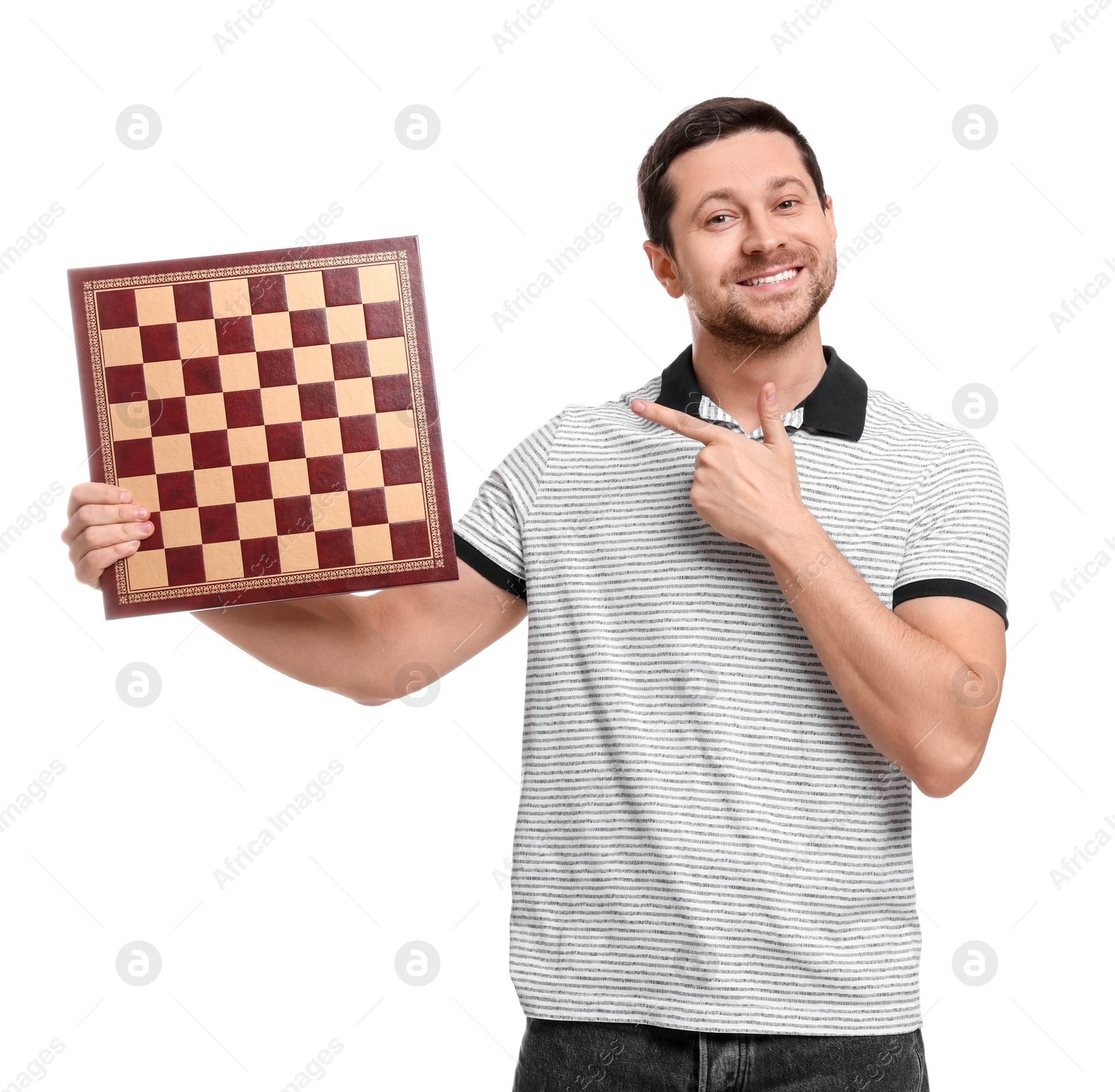 Photo of Smiling man showing chessboard on white background