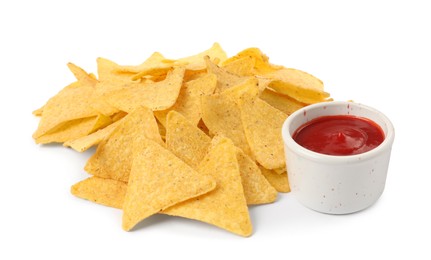 Tasty tortilla chips with ketchup on white background