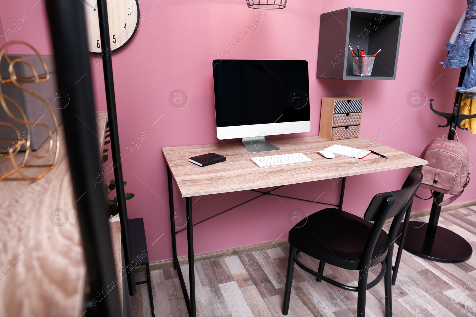 Photo of Comfortable workplace with computer on desk in home office