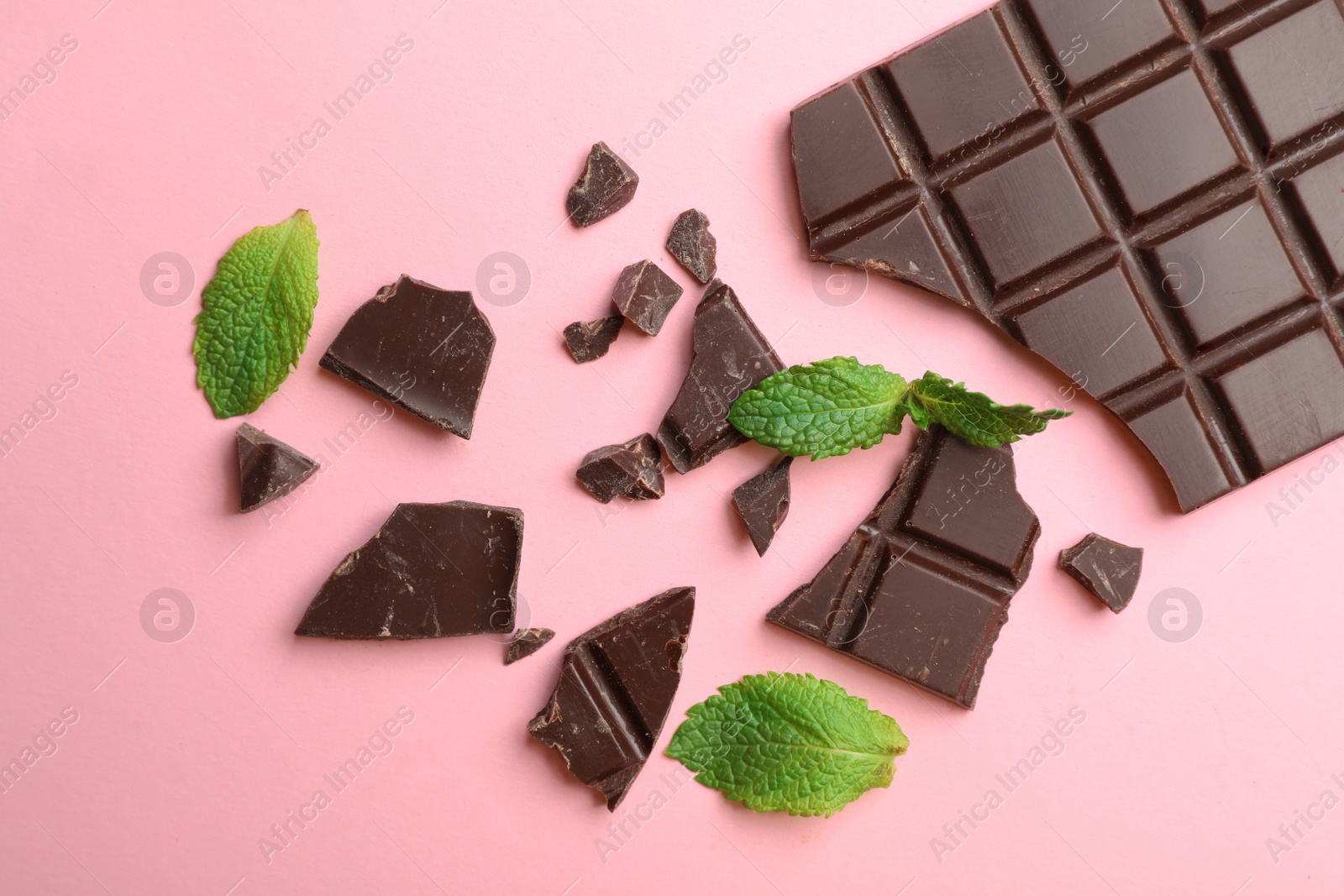 Photo of Flat lay composition with chocolate and mint on color background