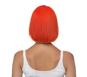 Young woman with bright dyed hair on white background, back view
