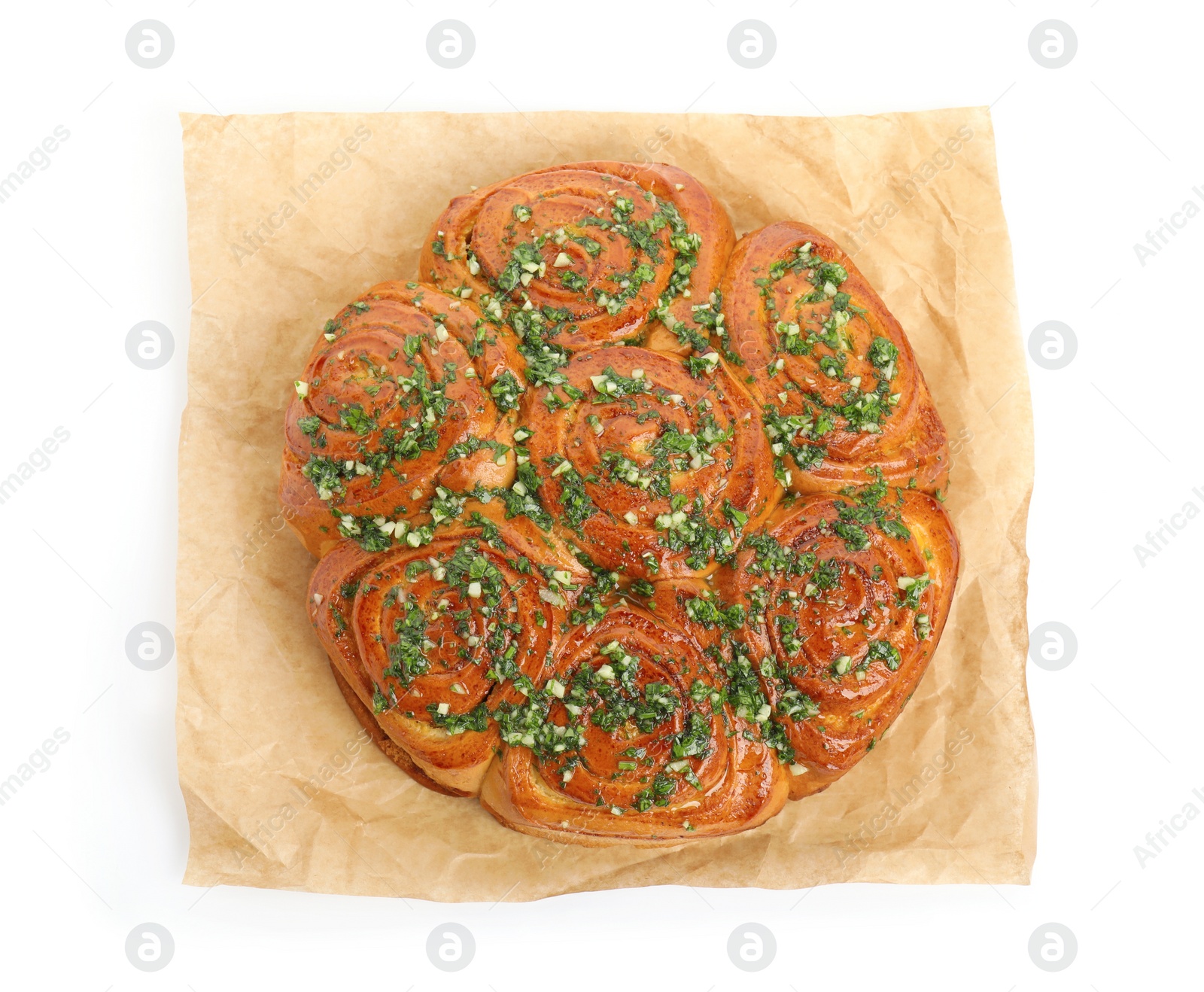 Photo of Traditional Ukrainian garlic bread with herbs (Pampushky) isolated on white, top view