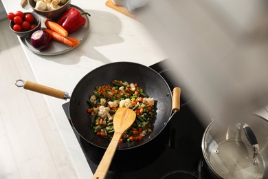 Frying pan with mix of fresh vegetables, above view