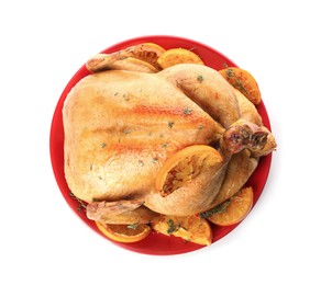 Photo of Roasted chicken with oranges isolated on white, top view