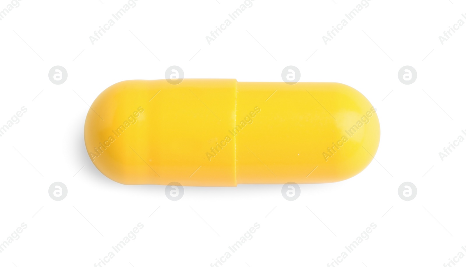 Photo of One pill isolated on white, top view