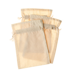 Photo of Cotton eco bags isolated on white, top view