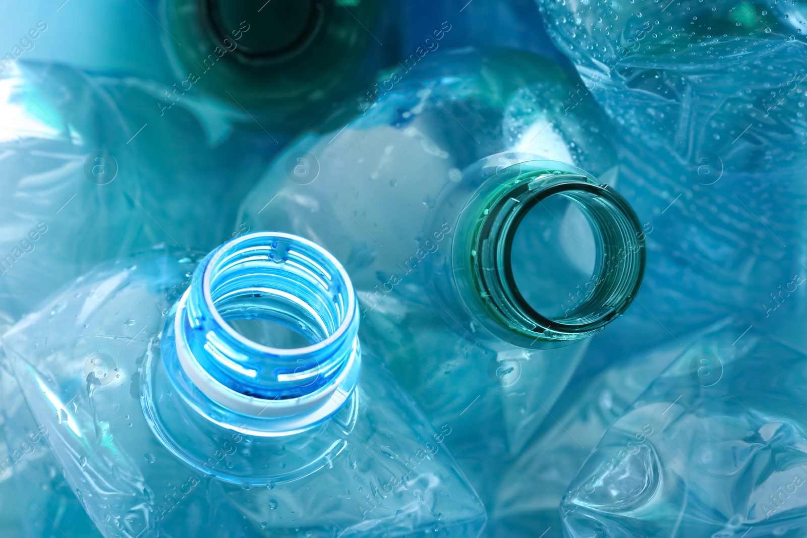 Photo of Many plastic bottles as background, closeup. Recycle concept