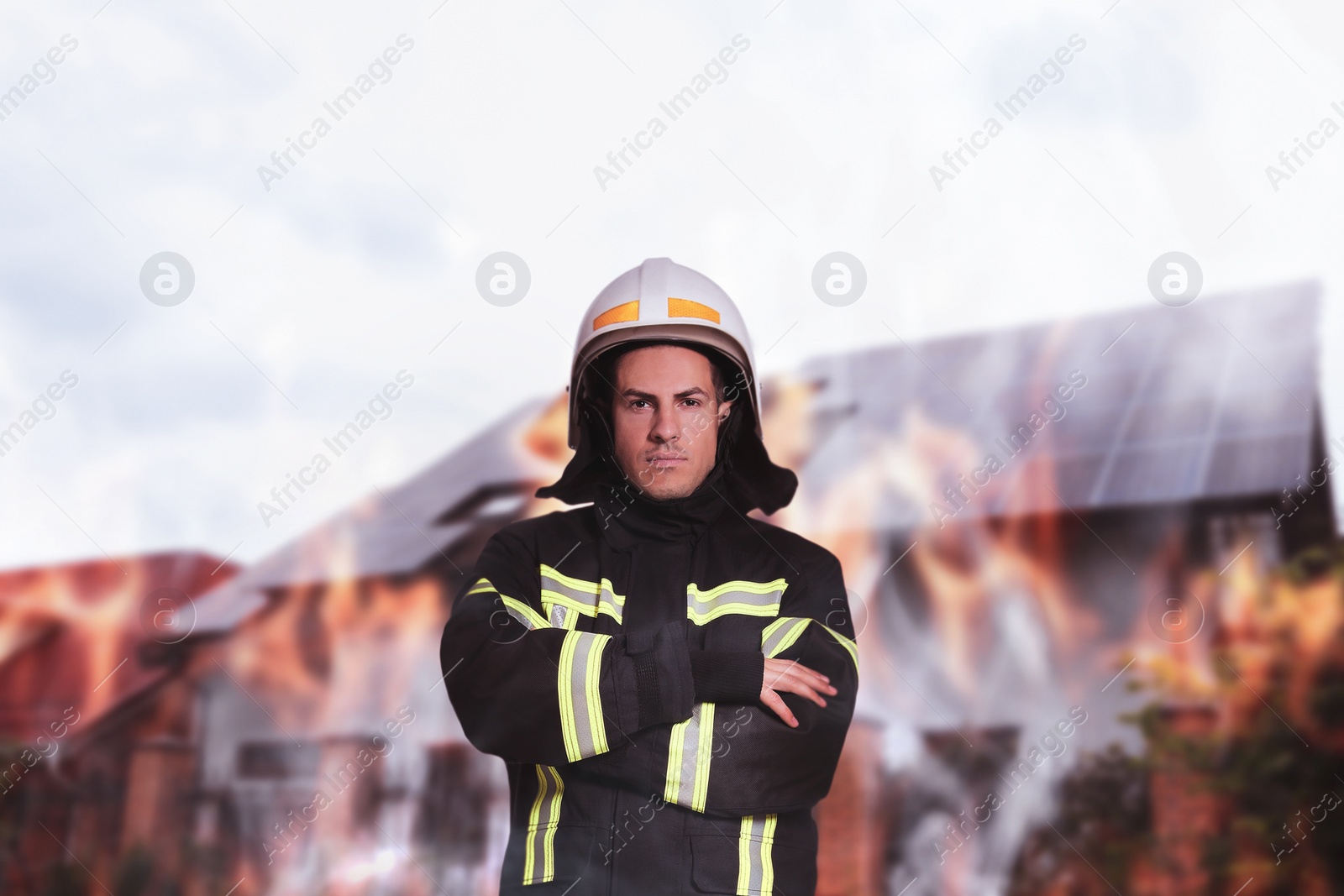 Image of Rescuer wearing uniform and helmet. Professional firefighter