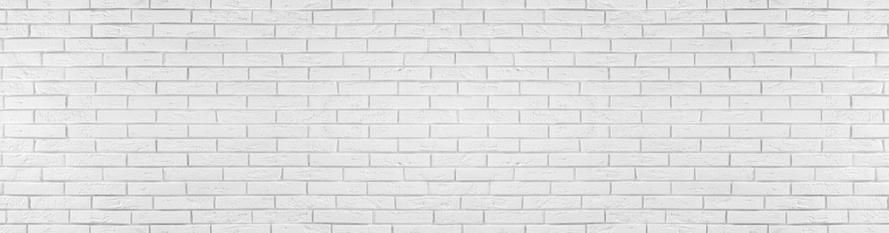 Image of White brick wall as background. Banner design