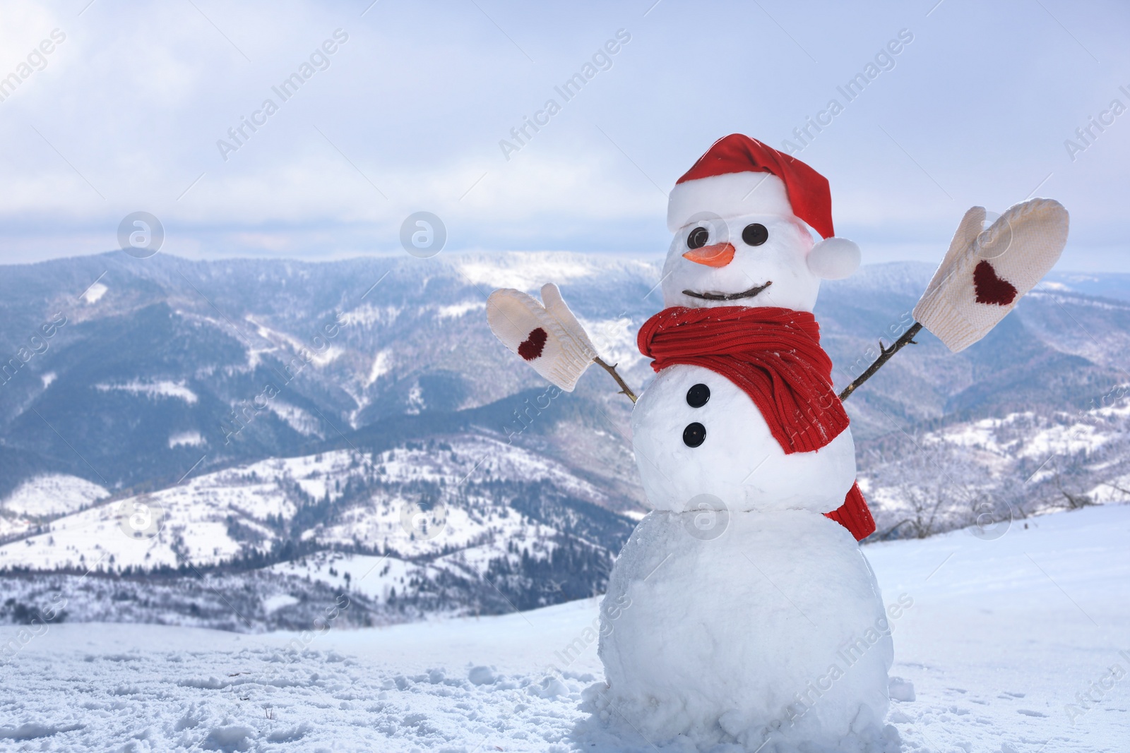 Image of Funny snowman outdoors on sunny day, space for text