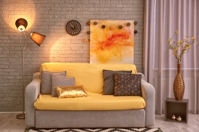 Photo of Modern room interior with cozy sofa