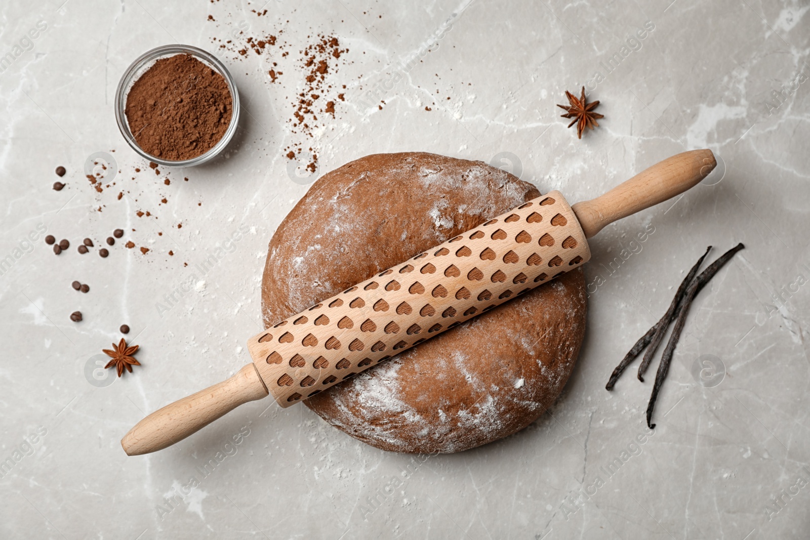 Photo of Flat lay composition with raw rye dough on grey background