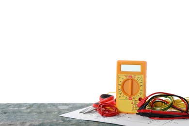 Photo of Set of electrician's tools and accessories on wooden table against white background. Space for text