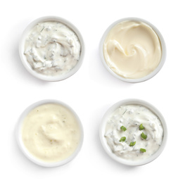 Image of Set of different delicious sauces on white background, top view