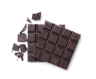 Photo of Delicious dark chocolate isolated on white, top view