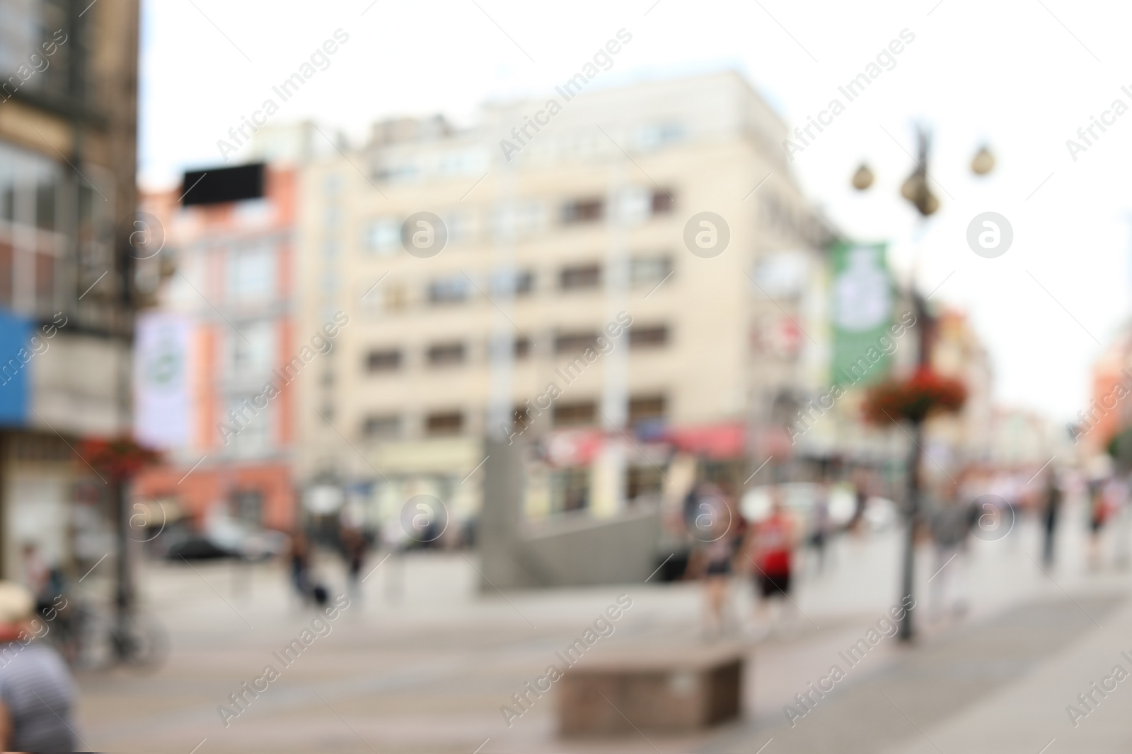 Photo of Blurred view of city street on sunny day