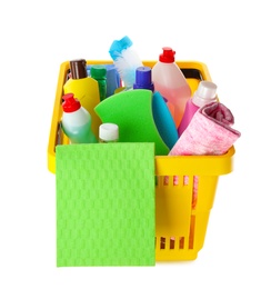 Yellow shopping basket with different household chemicals on white background