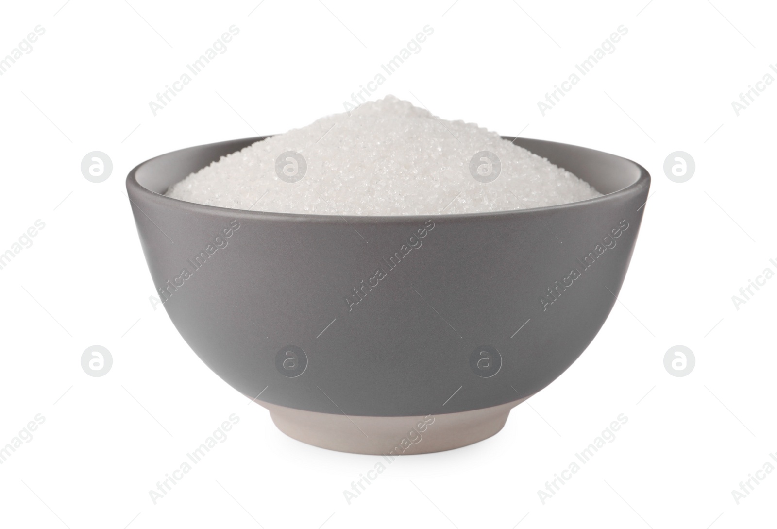 Photo of Bowl of granulated sugar isolated on white
