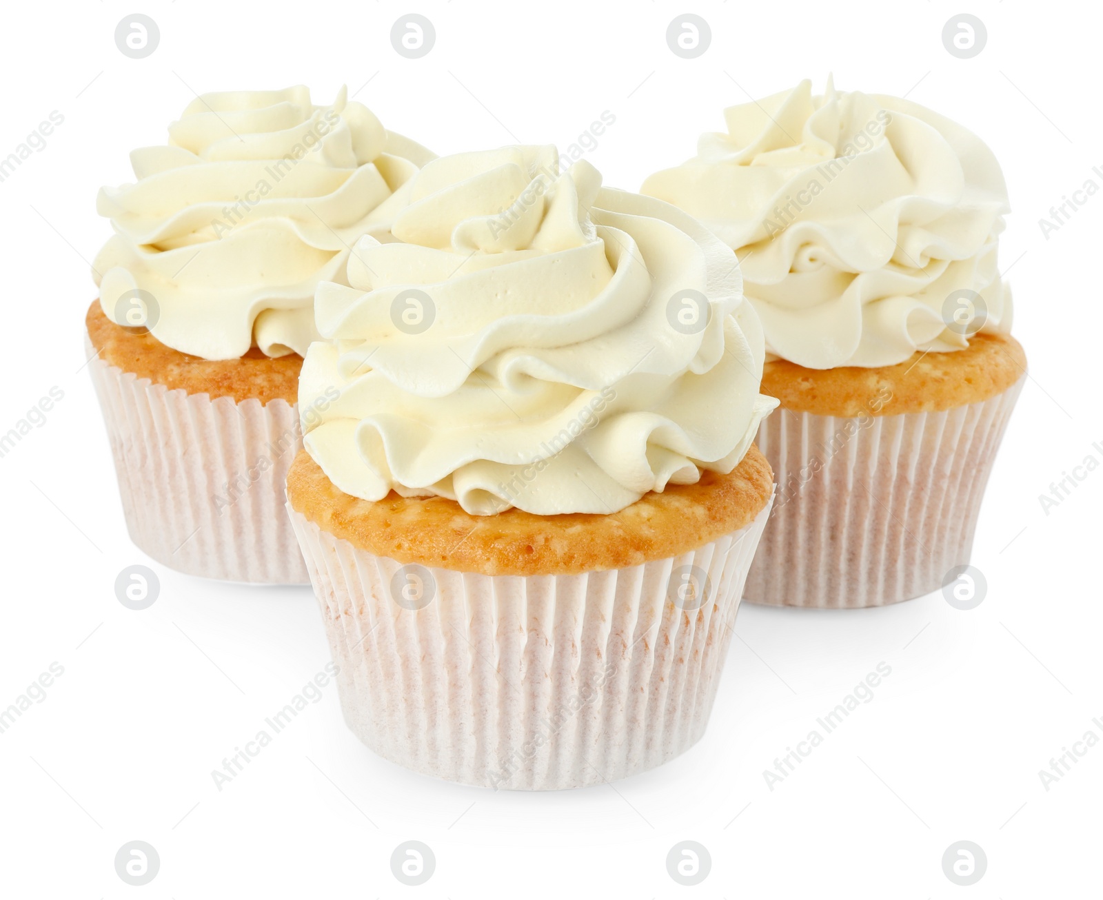 Photo of Tasty vanilla cupcakes with cream isolated on white