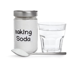 Jar and spoon with baking soda near glass of water on white background