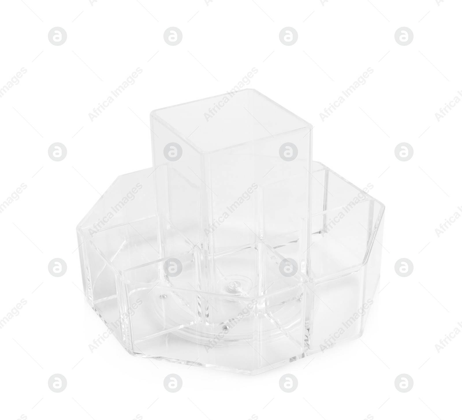 Photo of Empty lipstick holder on white background. Makeup organizer