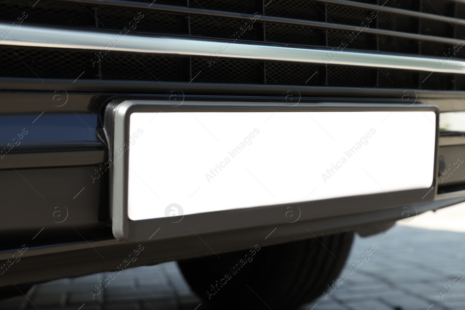 Photo of Car with vehicle registration plate outdoors, closeup