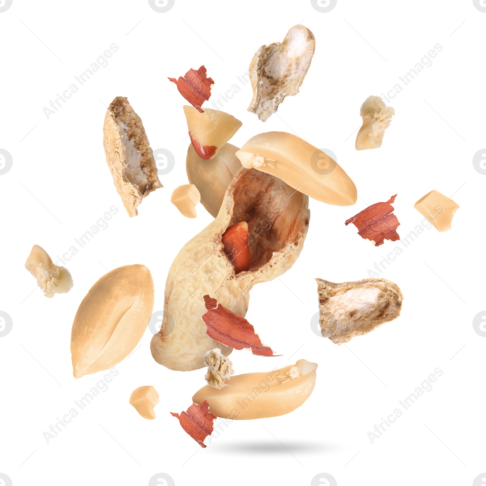 Image of Peanuts and crushed pod in air on white background