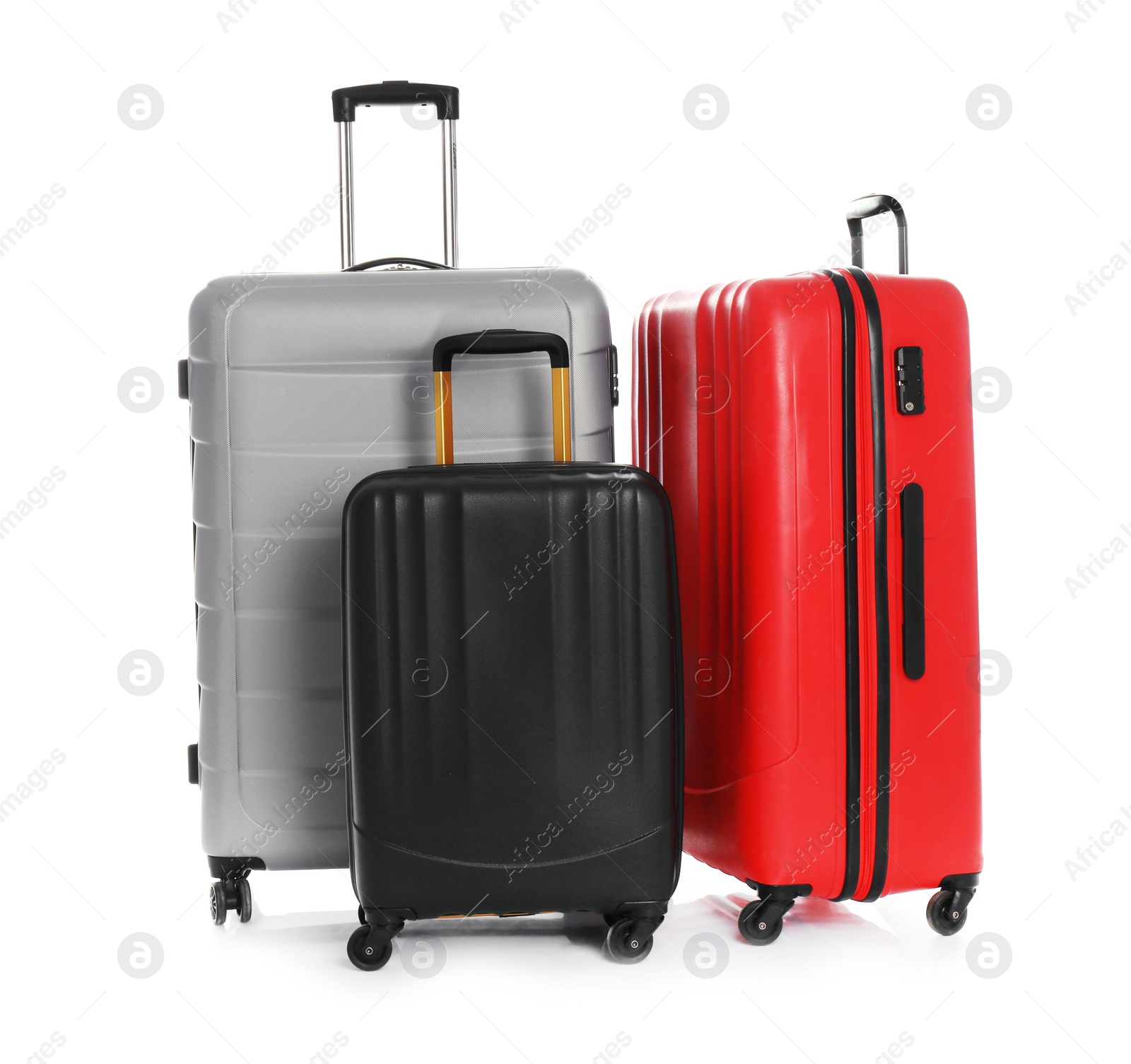 Photo of Modern suitcases for travelling on white background