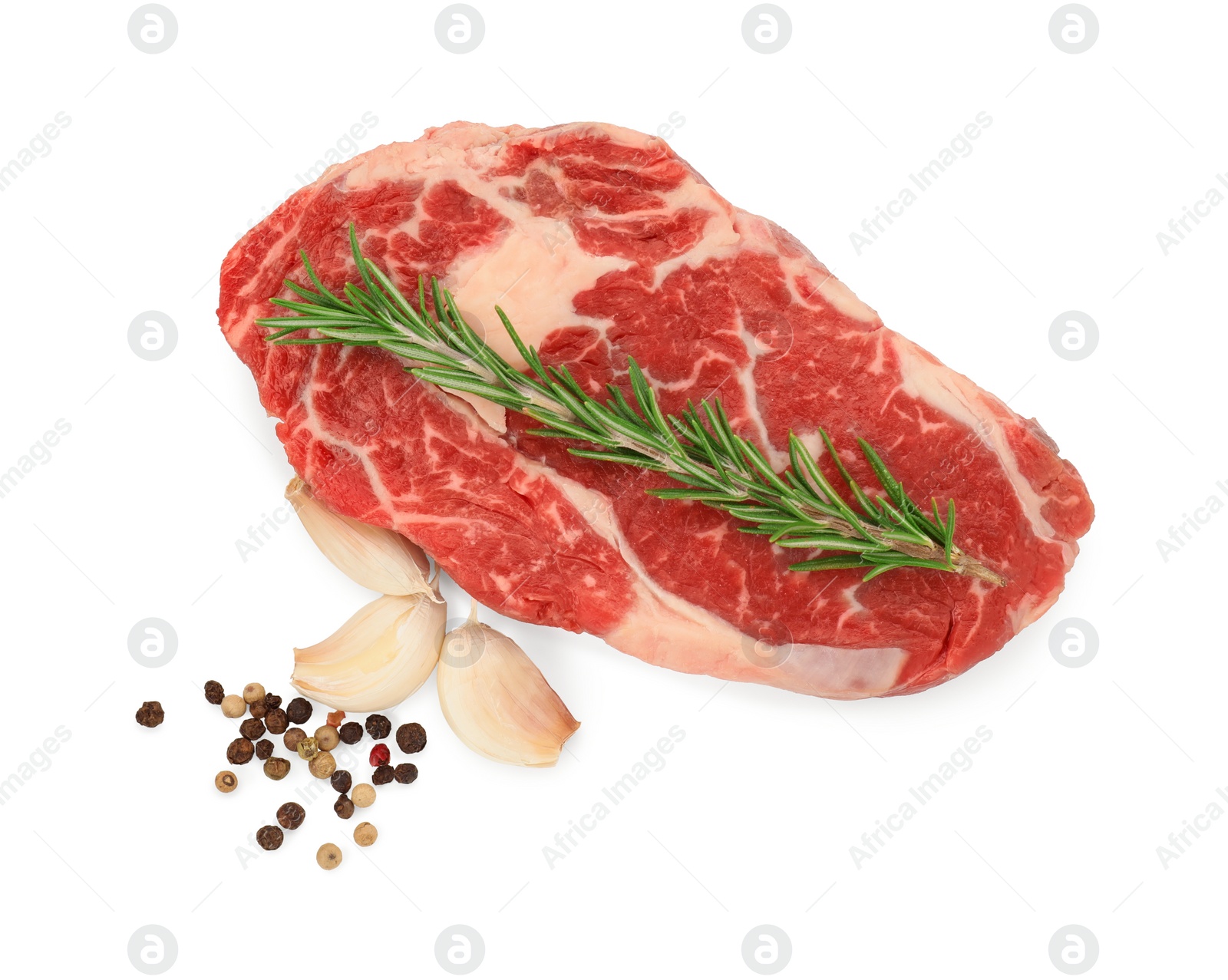 Photo of Raw beef steak and spices isolated on white, top view