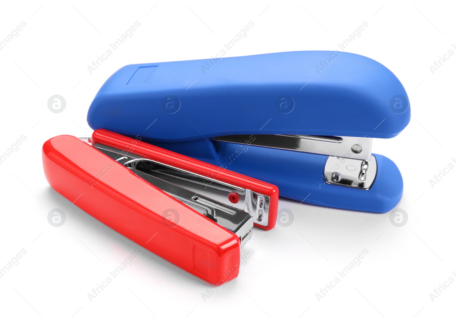 Photo of Two new bright staplers isolated on white