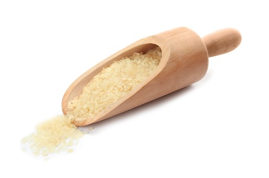 Photo of Scoop with uncooked rice on white background