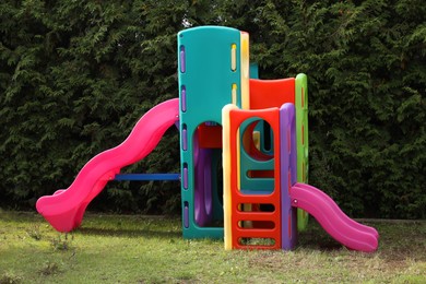 Children's colorful playground with slides and tunnel
outdoors