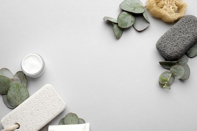 Photo of Flat lay composition with pumice stones on light grey background. Space for text