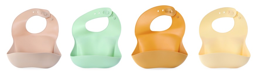 Set with different silicone baby bibs on white background, top view. Banner design