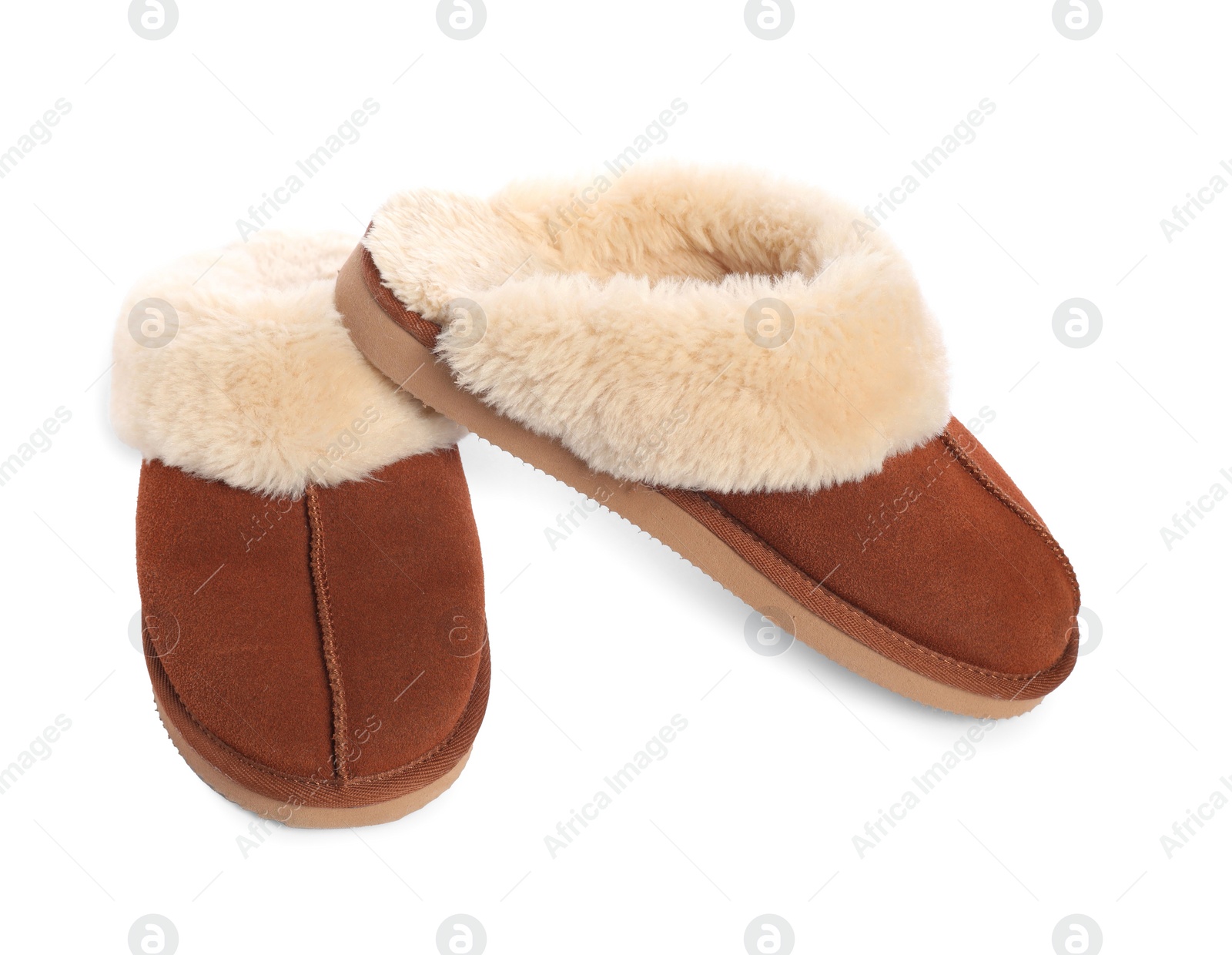 Photo of Pair of soft slippers with fur isolated on white