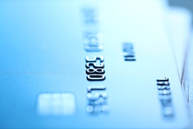 Photo of One credit card as background, macro view