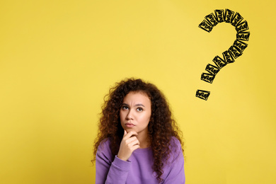 Image of African American woman with drawing of question mark on yellow background