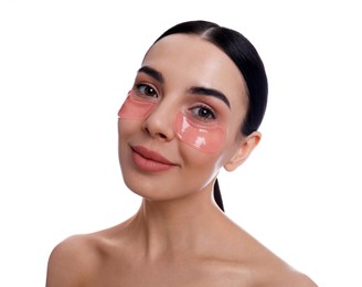 Photo of Beautiful young woman with under eye patches on white background