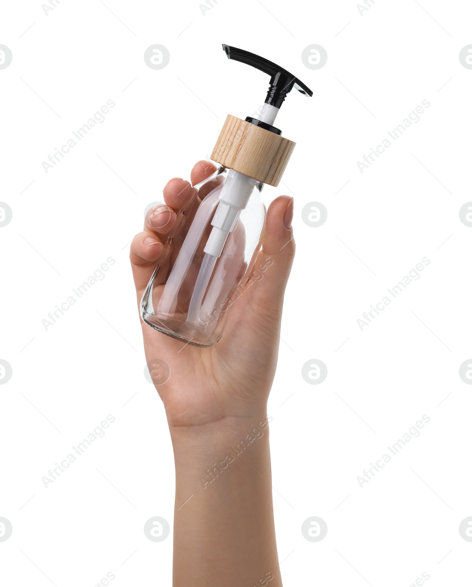 Photo of Woman holding new empty glass bottle with pump dispenser isolated on white, closeup