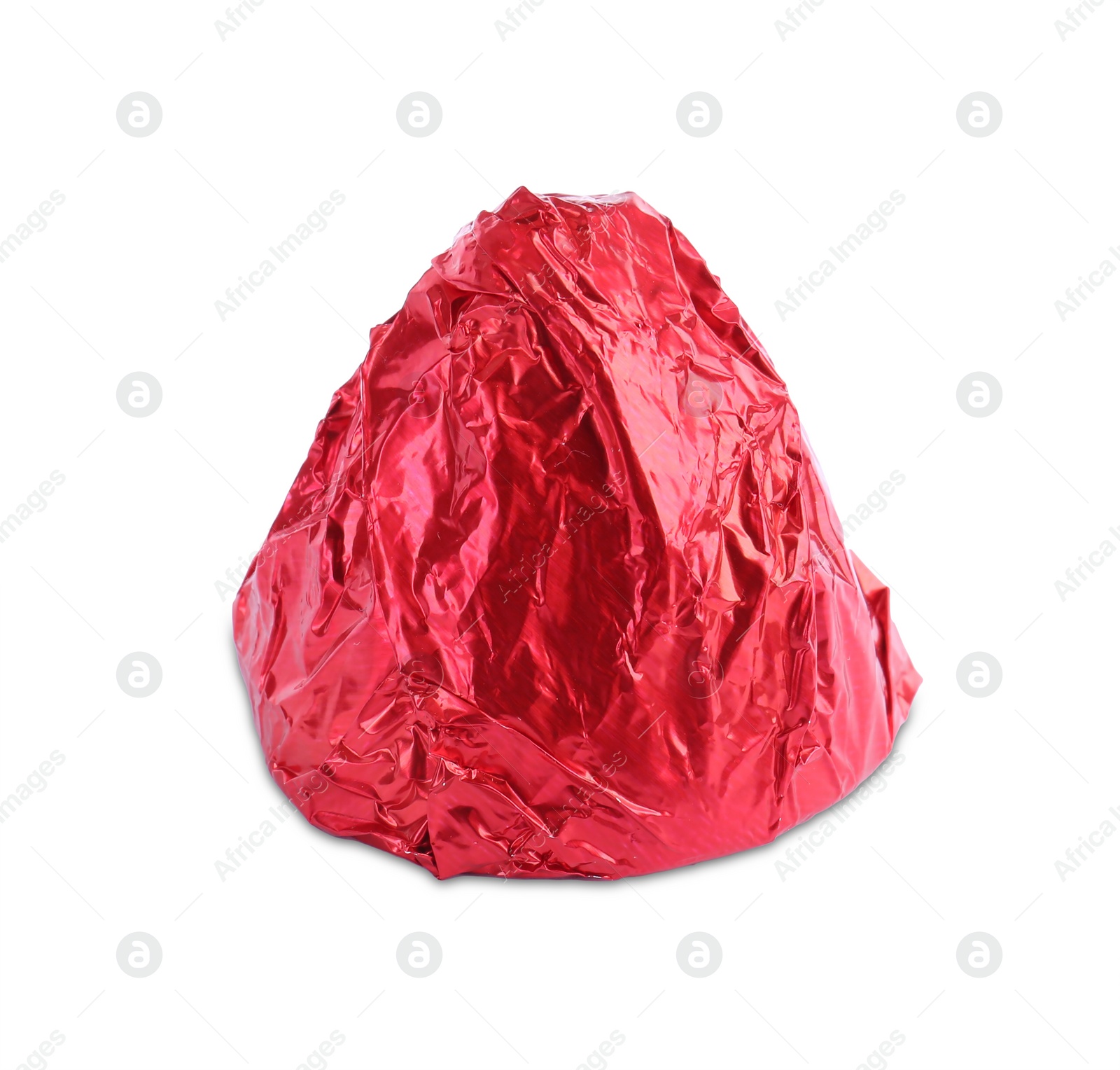 Photo of Tasty candy in red wrapper isolated on white