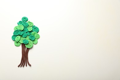 Photo of Beautiful tree made of plasticine on white background, top view